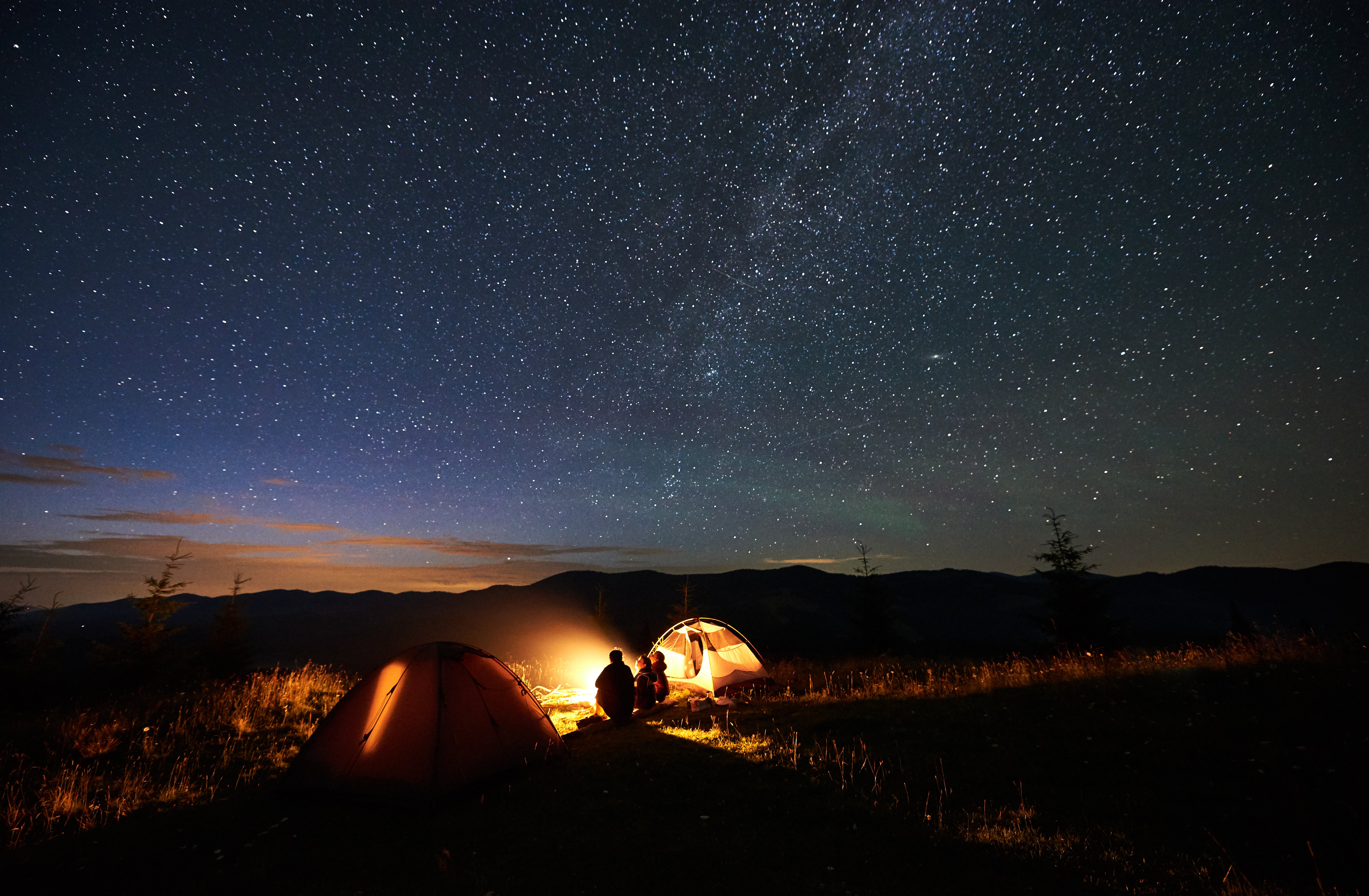 mother-and-two-sons-hikers-at-camping-in-mountains-2025-01-16-22-48-13-utc